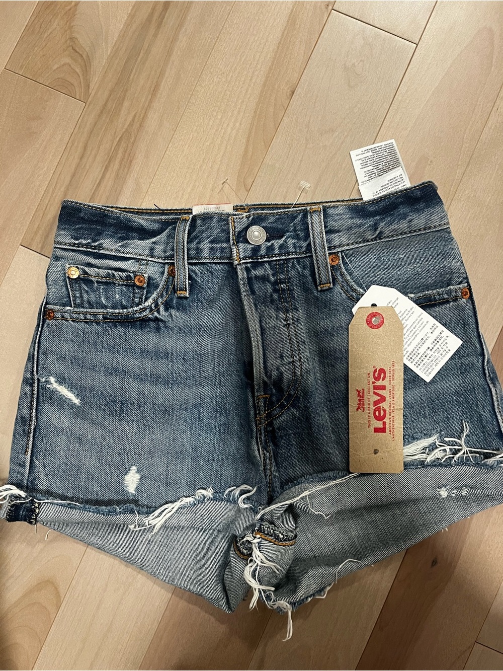 Levi's Medium Blue Distressed Denim Cutoff Shorts